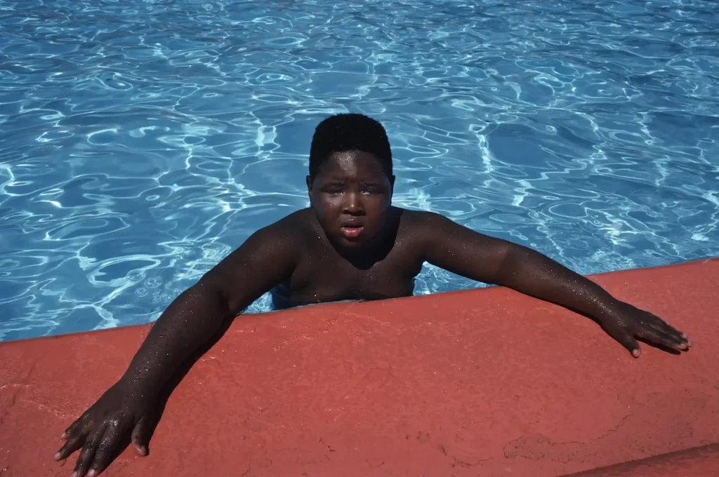 Joseph Rodriguez - Boy in Pool, Spanish Harlem, NY 1987